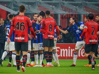 Hakan Calhanoglu and Ruben Loftus-Cheek are playing during the AC Milan versus FC Internazionale Serie A match at Giuseppe Meazza Stadium in...