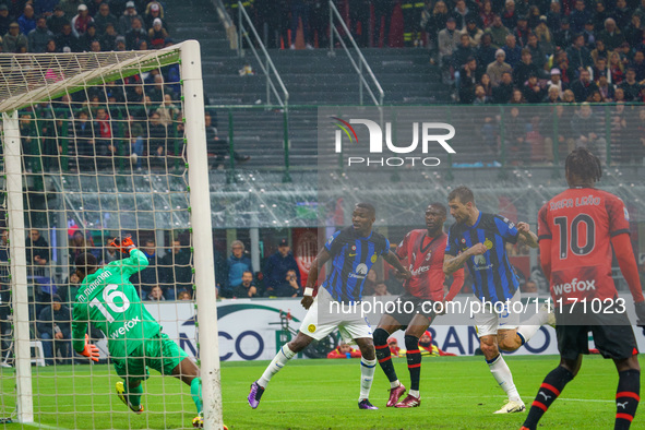 Francesco Acerbi is scoring a goal during the AC Milan versus FC Internazionale match in Serie A at Giuseppe Meazza Stadium on April 22, 202...