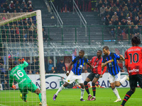 Francesco Acerbi is scoring a goal during the AC Milan versus FC Internazionale match in Serie A at Giuseppe Meazza Stadium on April 22, 202...