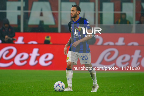 Hakan Calhanoglu is playing during the AC Milan versus FC Internazionale match in Serie A at Giuseppe Meazza Stadium on April 22, 2024. 