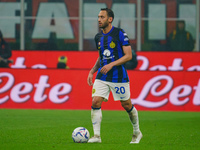 Hakan Calhanoglu is playing during the AC Milan versus FC Internazionale match in Serie A at Giuseppe Meazza Stadium on April 22, 2024. (