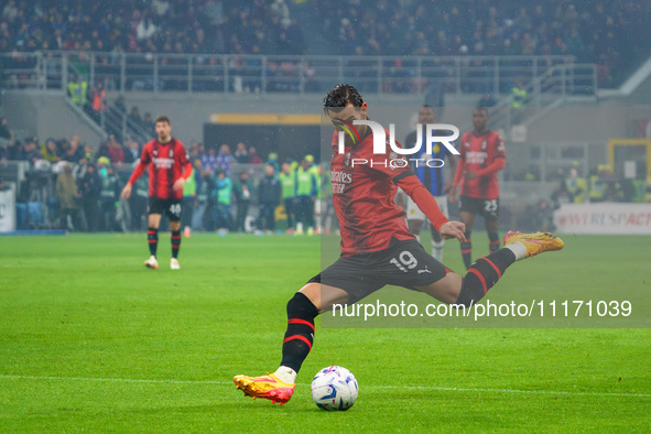 Theo Hernandez is playing for AC Milan against FC Internazionale in a Serie A match at Giuseppe Meazza Stadium on April 22, 2024. 