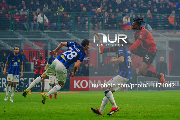 Rafael Leao and Benjamin Pavard are playing during the AC Milan versus FC Internazionale match in Serie A at Giuseppe Meazza Stadium on Apri...