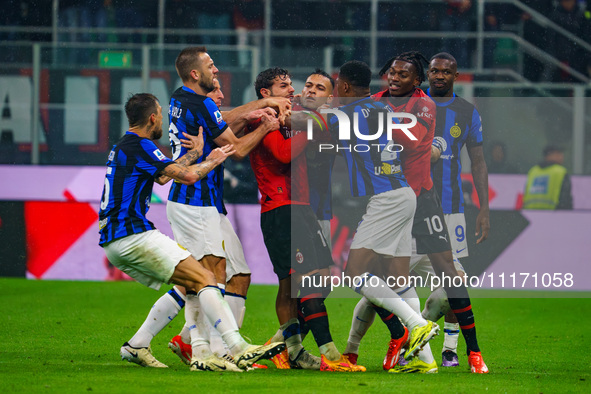 Theo Hernandez and Denzel Dumfries are playing during the AC Milan versus FC Internazionale Serie A match at Giuseppe Meazza Stadium in Mila...