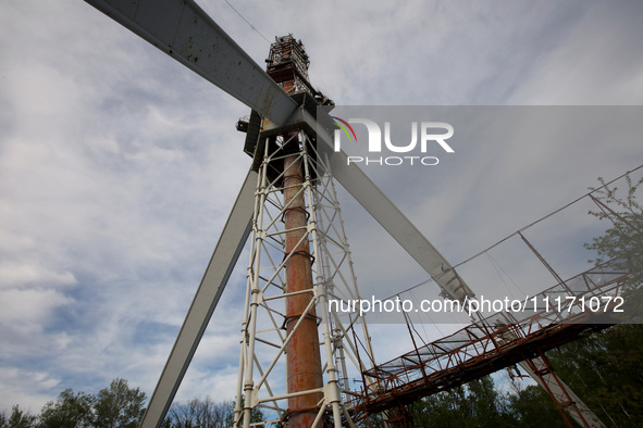 A Russian missile attack is partially destroying the Kharkiv TV tower in Kharkiv, northeastern Ukraine, on April 22, 2024. NO USE RUSSIA. NO...