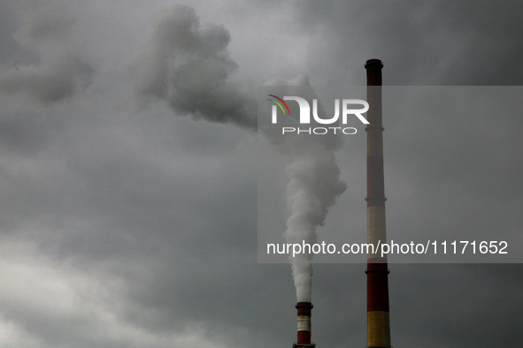 The chimneys of the PGE Energia Ciepla power plant, which are fired with hard coal, are emitting smoke in Krakow, Poland, on April 20, 2024....