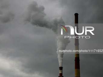 The chimneys of the PGE Energia Ciepla power plant, which are fired with hard coal, are emitting smoke in Krakow, Poland, on April 20, 2024....