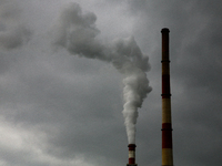 The chimneys of the PGE Energia Ciepla power plant, which are fired with hard coal, are emitting smoke in Krakow, Poland, on April 20, 2024....