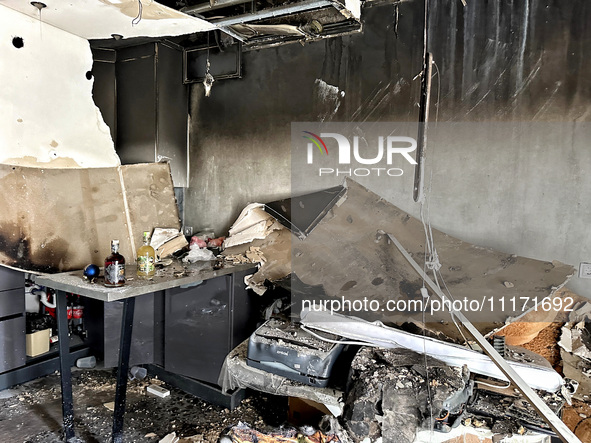 A kitchen is burning out in a residential building that is being damaged by a nighttime Russian drone attack in Odesa, Southern Ukraine, on...