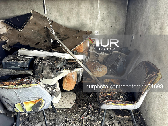 Burnt-out furniture is visible in a residential building that was damaged by a nighttime Russian drone attack in Odesa, Ukraine, on April 23...