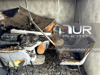 Burnt-out furniture is visible in a residential building that was damaged by a nighttime Russian drone attack in Odesa, Ukraine, on April 23...