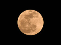 The 'Pink Moon,' which is April's full Moon, is being seen from Nagaon District, Assam, India, on April 23, 2024. (