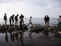 People are enjoying their holiday at Marunda public beach on the north coast of Jakarta, Indonesia, on April 23, 2024. Marunda Beach is the...