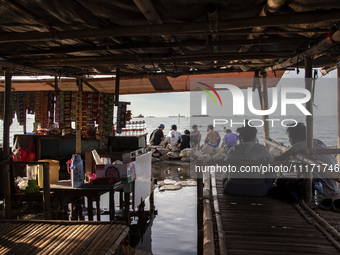 People are enjoying their holiday at Marunda public beach on the north coast of Jakarta, Indonesia, on April 23, 2024. Marunda Beach is the...