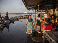 People are enjoying their holiday at Marunda public beach on the north coast of Jakarta, Indonesia, on April 23, 2024. Marunda Beach is the...