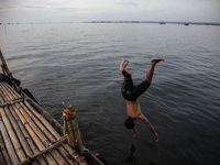 People are enjoying their holiday at Marunda public beach on the north coast of Jakarta, Indonesia, on April 23, 2024. Marunda Beach is the...