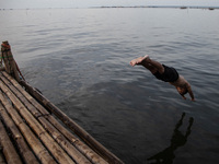 People are enjoying their holiday at Marunda public beach on the north coast of Jakarta, Indonesia, on April 23, 2024. Marunda Beach is the...