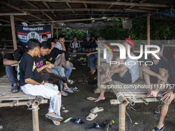 People are enjoying their holiday at Marunda public beach on the north coast of Jakarta, Indonesia, on April 23, 2024. Marunda Beach is the...