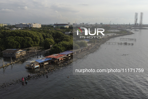 An aerial view is showing Marunda public beach on the north coast of Jakarta, Indonesia, on April 23, 2024. Marunda Beach is the last beach...