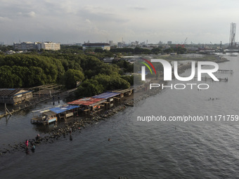 An aerial view is showing Marunda public beach on the north coast of Jakarta, Indonesia, on April 23, 2024. Marunda Beach is the last beach...