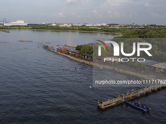 An aerial view is showing Marunda public beach on the north coast of Jakarta, Indonesia, on April 23, 2024. Marunda Beach is the last beach...