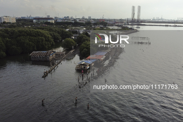 An aerial view is showing Marunda public beach on the north coast of Jakarta, Indonesia, on April 23, 2024. Marunda Beach is the last beach...