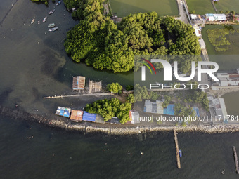 An aerial view is showing Marunda public beach on the north coast of Jakarta, Indonesia, on April 23, 2024. Marunda Beach is the last beach...