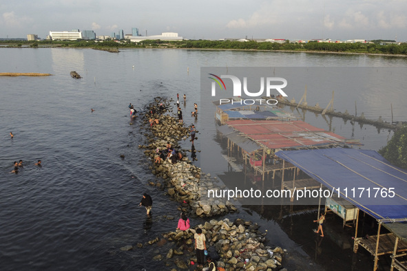 An aerial view is showing Marunda public beach on the north coast of Jakarta, Indonesia, on April 23, 2024. Marunda Beach is the last beach...