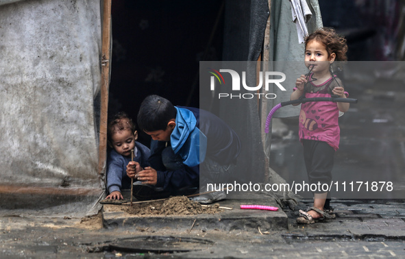 Displaced Palestinian children are playing as they shelter in a UNRWA-affiliated school in Deir Al-Balah, in the central Gaza Strip, on Apri...