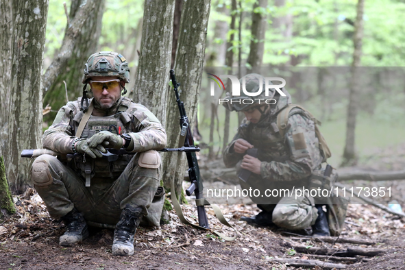 Soldiers are getting ready for the start of the drills of the Liut (Fury) Brigade of the National Police of Ukraine at a training area in th...