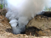 Soldiers are practicing clearing a trench from the enemy in pairs during the drills of the Liut (Fury) Brigade of the National Police of Ukr...