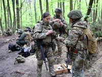 Soldiers are getting ready for the start of the drills of the Liut (Fury) Brigade of the National Police of Ukraine at a training area in th...