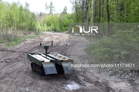 The VEPR ground logistics robotic complex, which is used for delivering mines and evacuating the wounded, is being pictured during drills of...