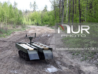 The VEPR ground logistics robotic complex, which is used for delivering mines and evacuating the wounded, is being pictured during drills of...