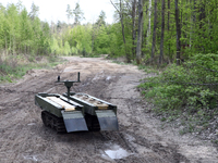 The VEPR ground logistics robotic complex, which is used for delivering mines and evacuating the wounded, is being pictured during drills of...