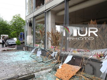 Broken windows are being pictured in the Shevchenkivskyi district after a Russian missile attack in Kharkiv, northeastern Ukraine, on April...