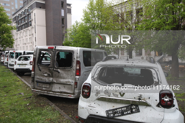 Damaged cars are being pictured in the Shevchenkivskyi district after a Russian missile attack in Kharkiv, Ukraine, on April 24, 2024. NO US...