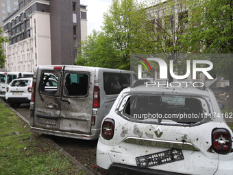 Damaged cars are being pictured in the Shevchenkivskyi district after a Russian missile attack in Kharkiv, Ukraine, on April 24, 2024. NO US...