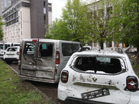 Damaged cars are being pictured in the Shevchenkivskyi district after a Russian missile attack in Kharkiv, Ukraine, on April 24, 2024. NO US...