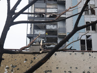 A high-rise with broken windows is being pictured in the Shevchenkivskyi district after a Russian missile attack in Kharkiv, Ukraine, on Apr...