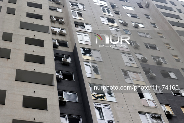 A high-rise with broken windows is being pictured in the Shevchenkivskyi district after a Russian missile attack in Kharkiv, northeastern Uk...