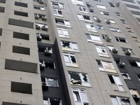 A high-rise with broken windows is being pictured in the Shevchenkivskyi district after a Russian missile attack in Kharkiv, northeastern Uk...