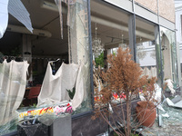 Broken windows are being pictured in the Shevchenkivskyi district after a Russian missile attack in Kharkiv, northeastern Ukraine, on April...