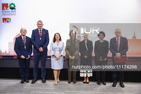 Queen Sofia of Spain, HRH Princess Muna Al Hussein of Jordan, Paola Barbarino, Wojciech Konieczny and Zbigniew Tomczak pose for a family pho...