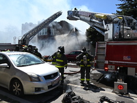 The Chicago Fire Department is responding to a heavy fire in a building on South Kostner Avenue in Chicago, Illinois, United States, on Apri...