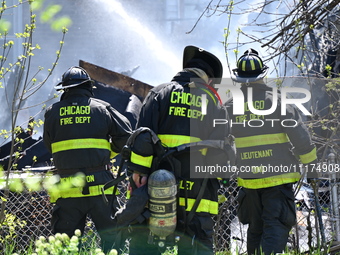 The Chicago Fire Department is responding to a heavy fire in a building on South Kostner Avenue in Chicago, Illinois, United States, on Apri...