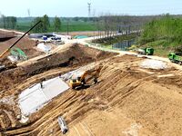 Workers are reinforcing beaches and embankments in Suqian, Jiangsu Province, China, on April 25, 2024. (