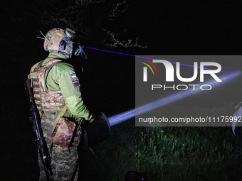 A soldier from a mobile air defense unit of the Armed Forces of Ukraine is working in the Odesa region, southern Ukraine, on April 24, 2024....