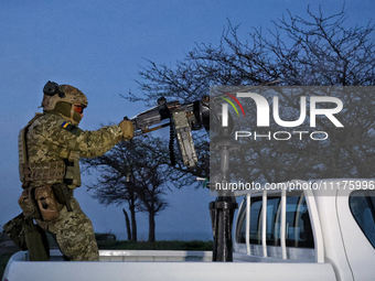 A soldier from a mobile air defense unit of the Armed Forces of Ukraine is working in the Odesa region, southern Ukraine, on April 24, 2024....