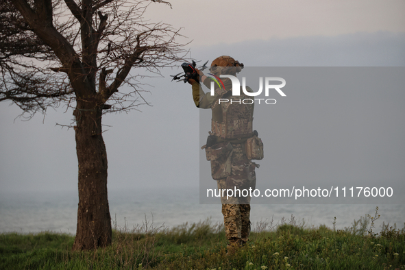 A soldier from a mobile air defense unit of the Armed Forces of Ukraine is working in the Odesa region, southern Ukraine, on April 24, 2024....